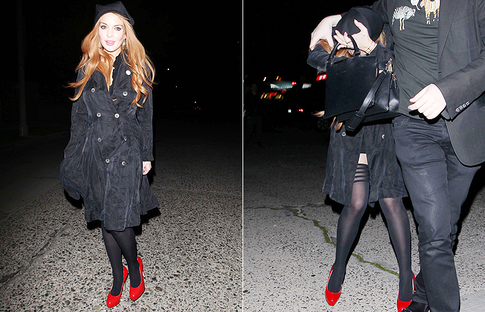 Lindsay Lohan usa modelito sexy por baixo de casaco bem comportado