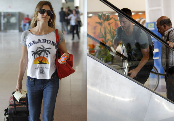  Fernanda Lima não larga o celular em aeroporto no Rio