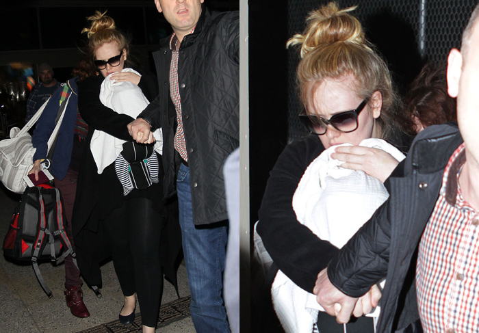 Adele causa agita aeroporto ao desembarcar com seu bebê