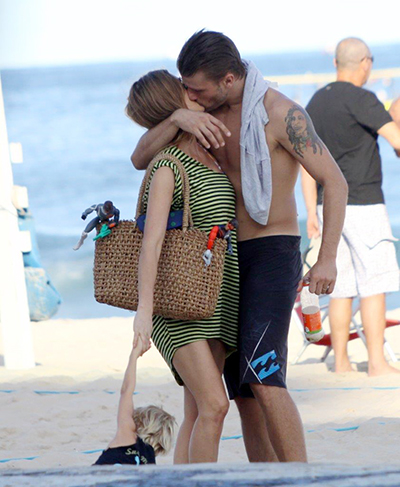 Fernanda Lima e Rodrigo Hilbert beijam muito após tarde na praia
