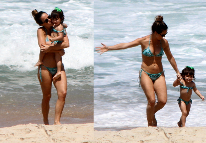 Fernanda Pontes vai à praia com o marido e a filha