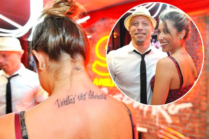 Giselle Itié tatua a frase Veritas vos liberabit, que em latim significa A Verdade Vos Libertará, nas costas, no Rock In Rio 2013