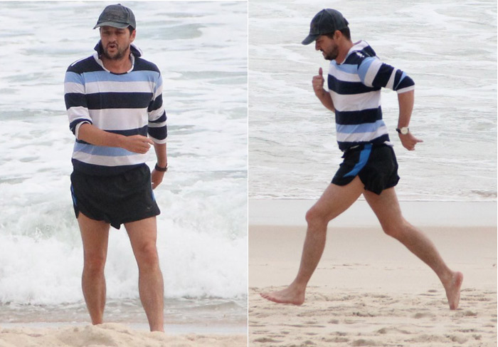 Marcelo Serrado se exercita na praia em Ipanema com personal trainer