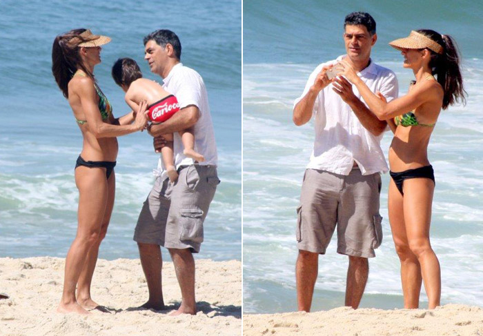 Eduardo Moscovis e Cynthia Howlett trocam muitos beijos na praia