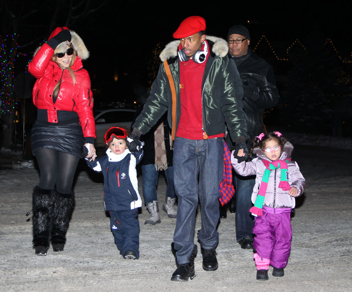 Mariah Carey se agasalha para passear na neve com a família