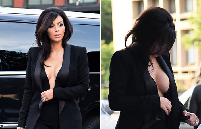 Kim Kardashian circula com look super decotado