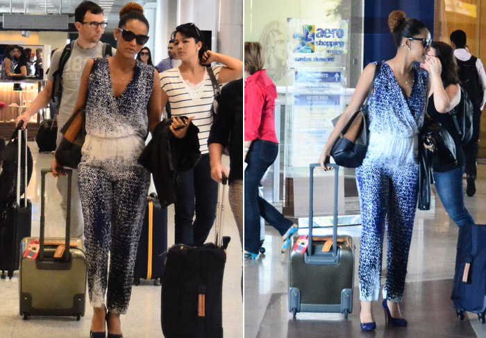 De macacão e salto alto, Taís Araújo embarca no Rio de Janeiro