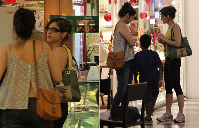 Afastada de Império, Drica Moraes passeia com o filho no shopping