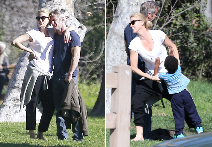 Sean Penn e Charlize Theron trocam carícias e brincam no parque com Jackson 