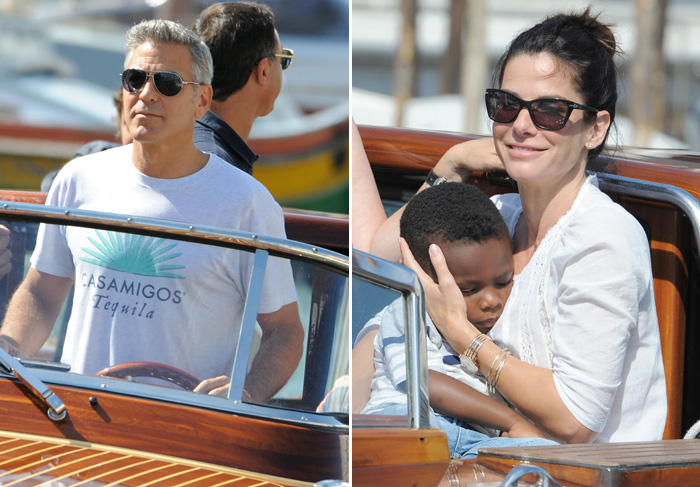George Clooney e Sandra Bullock passeiam de barco em Veneza