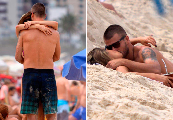 Fernanda Lima e Rodrigo Hilbert dão muito beijo na boca na areia da npraia