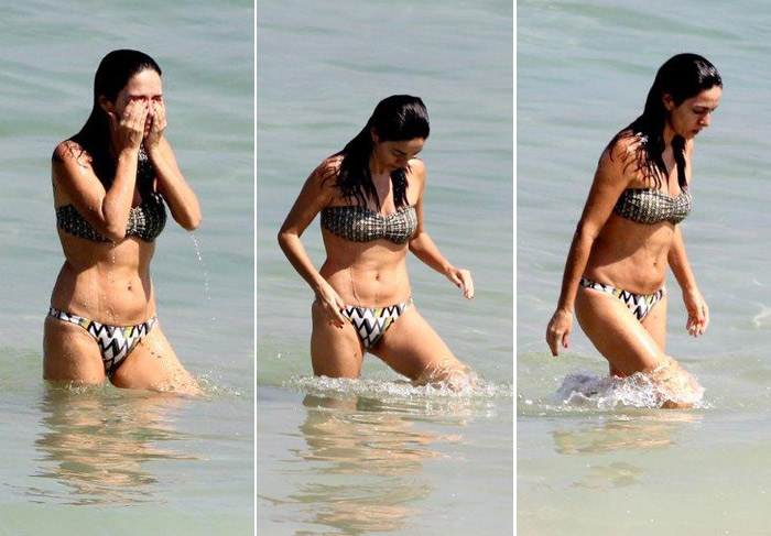 Claudia Ohana toma banho de mar na praia de Ipanema