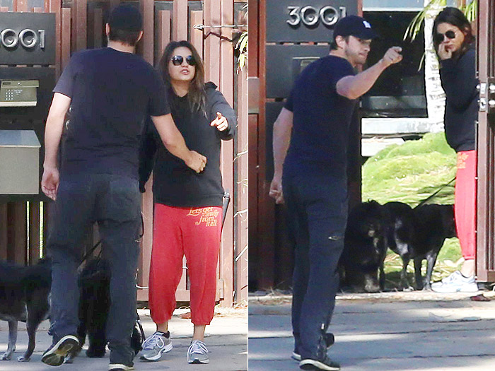 Mila Kunis discute com paparazzo enquanto caminha com Ashton Kutcher