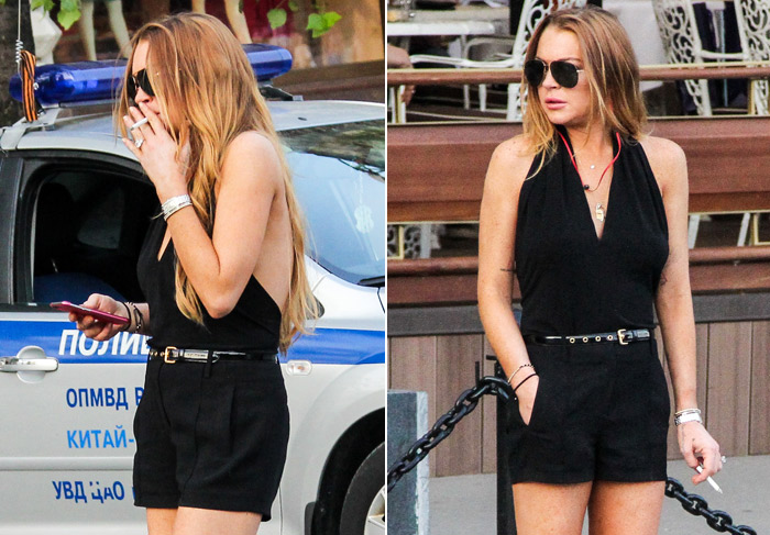 Lindsay Lohan fuma cigarrinho em passeio pela Rússia