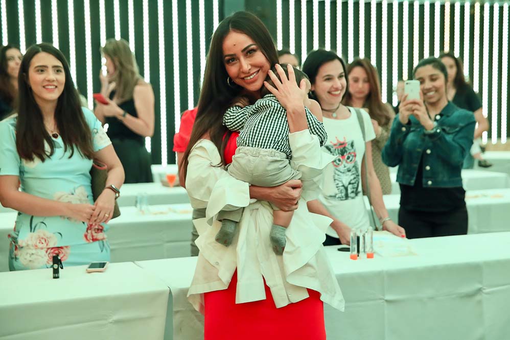 Sabrina, que é mãe da pequena Zoe, de 11 meses, se encantou com os bebês que estavam presentes no evento