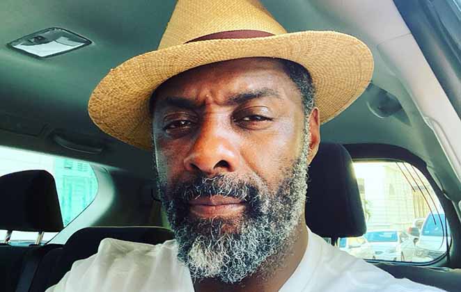 Idris Elba de chapéu