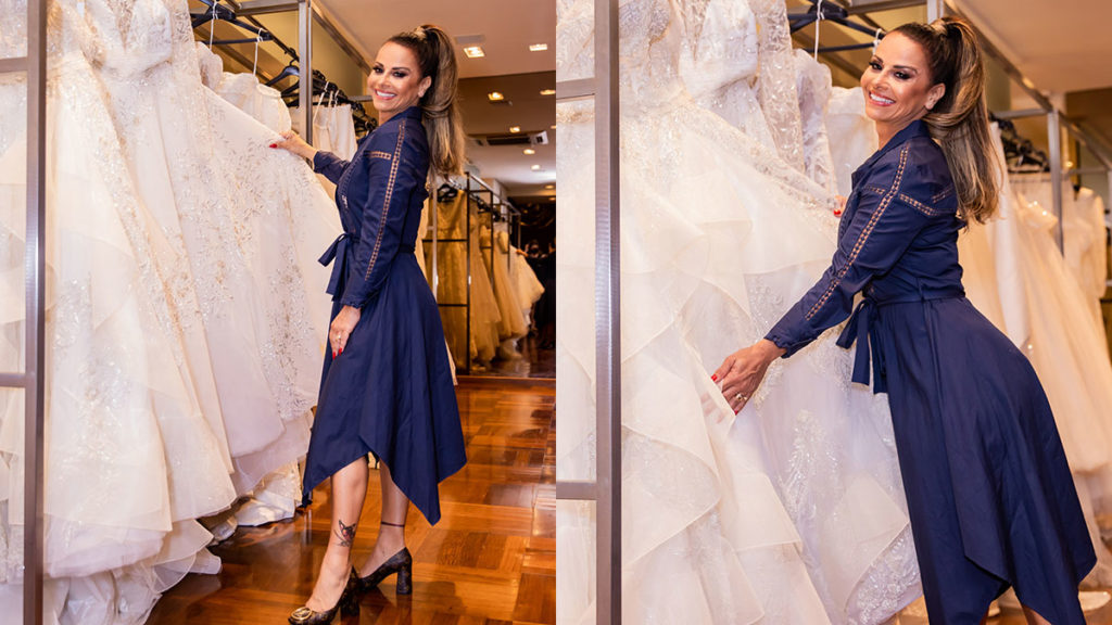 Viviane Araújo no meio de lindos vestidos de noiva