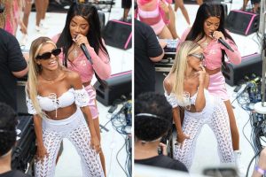 Brunna Gonçalves no trio elétrico com a esposa.