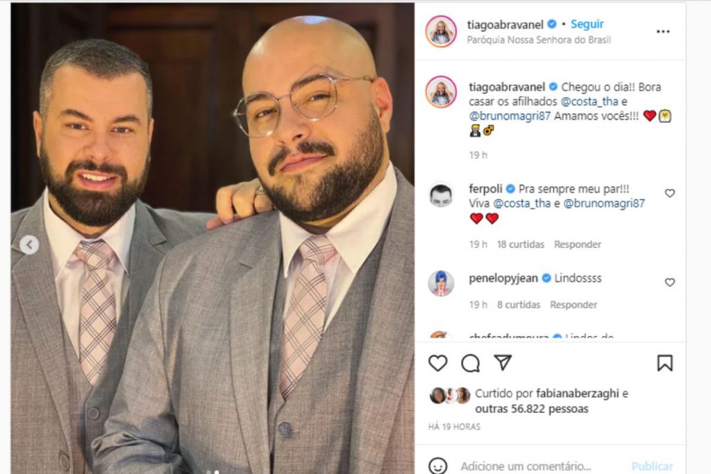 tiago abravanel posando de terno com o marido fernando poli no instagram