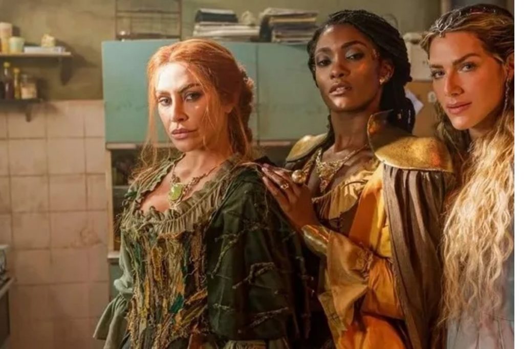 gio ewbank caracterizada como bruxa