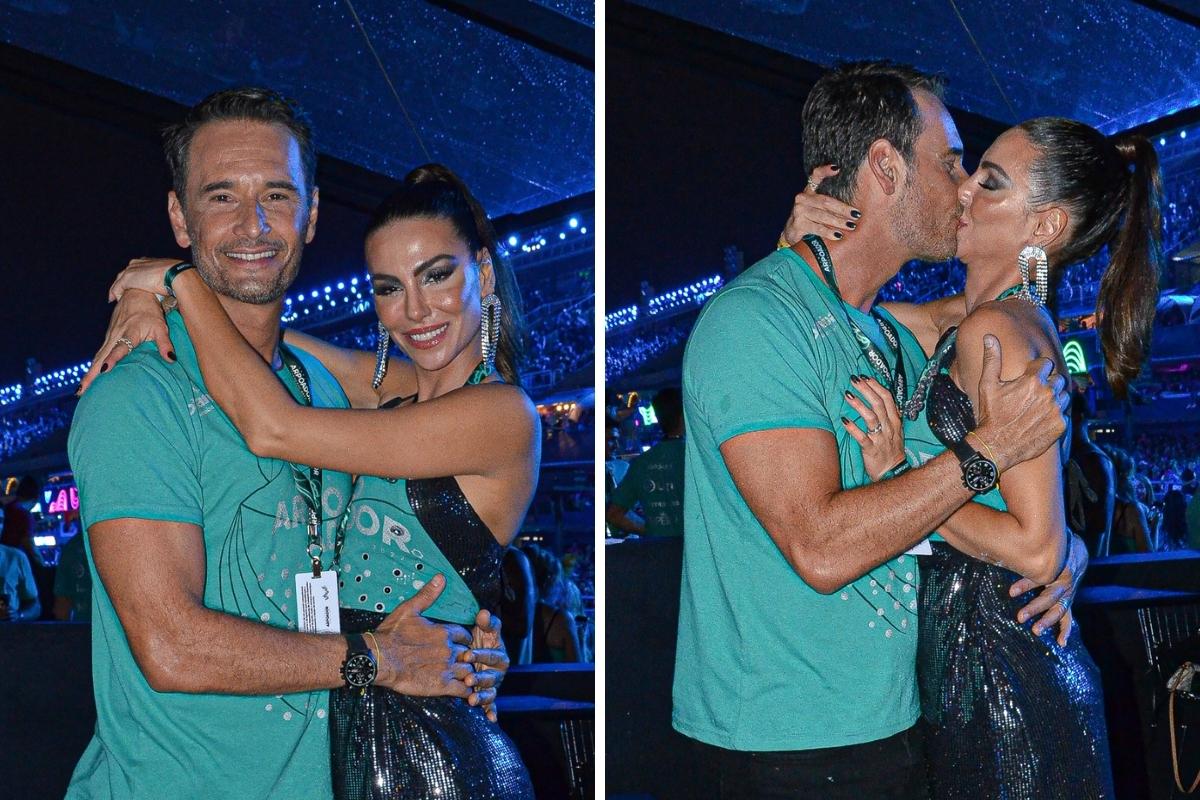 Rodrigo Santoro e Mel Fronckowiak posam para foto e se beijam em camarote do Desfila das Campeãs
