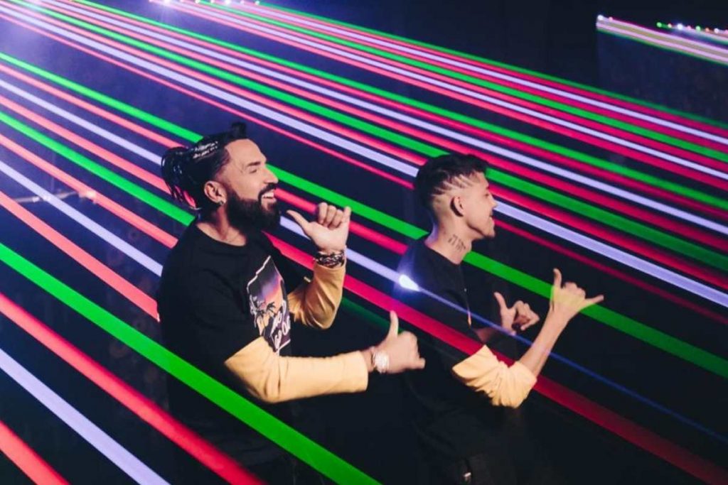 Latino e seu filho, Guilherme, em gravação de novo clipe