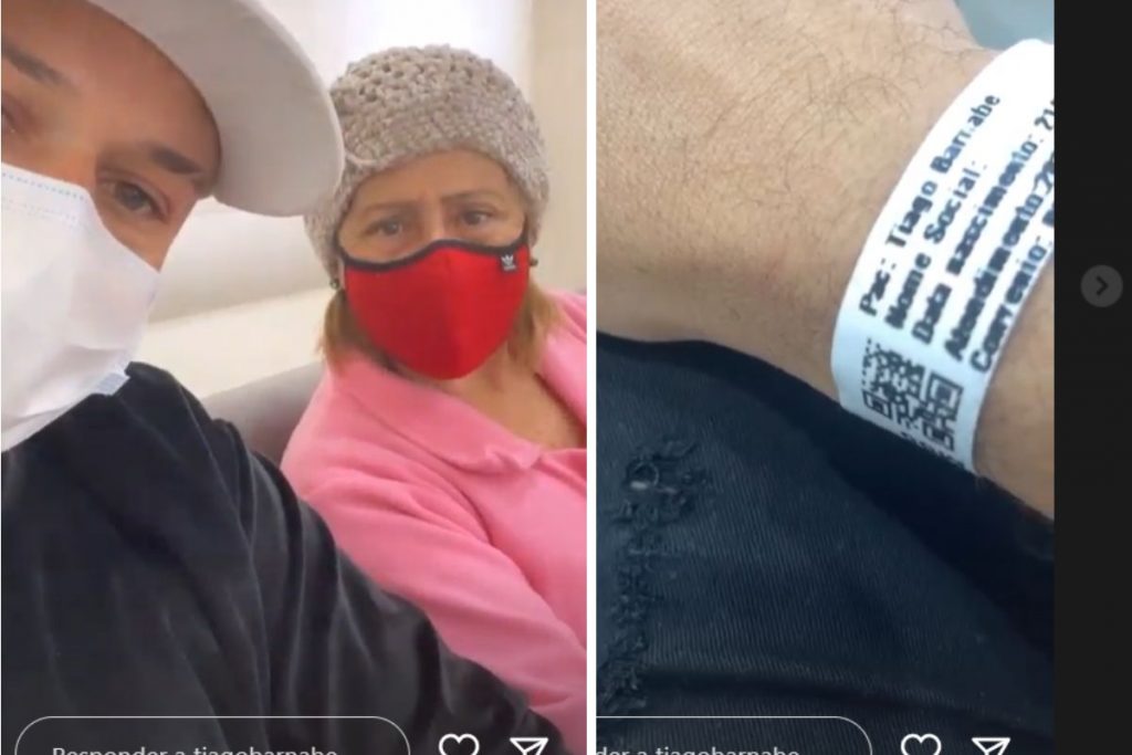 Tiago Barnabé com a mãe, aguardando atendimento em hospital