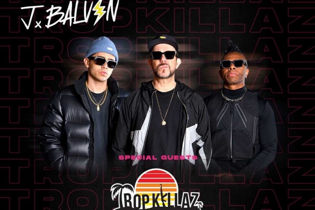 Cartaz anunciando Tropkillaz no show de J Balvin