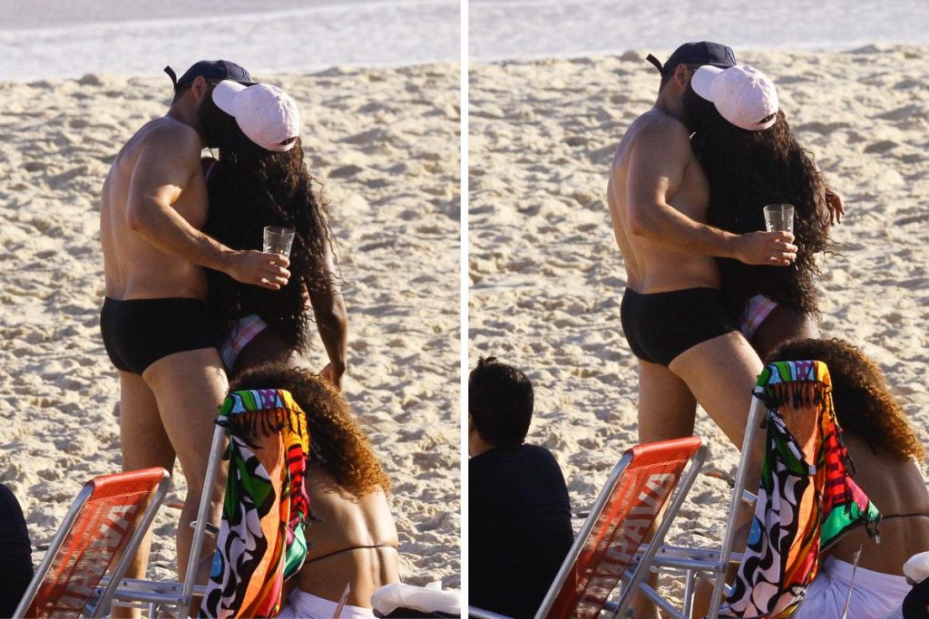 Erika Januza curtiu praia em clima de romance