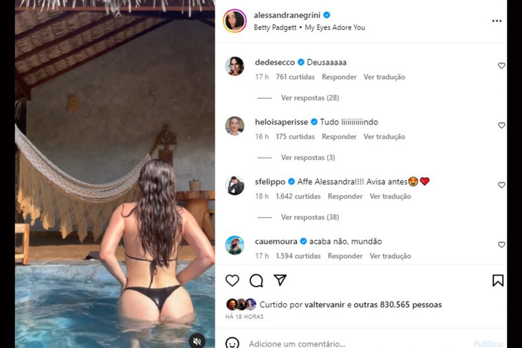 Alessandra Negrini curte banho de piscina com biquíni preto