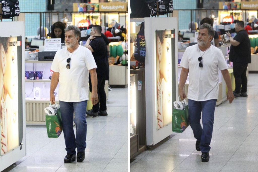 Marcos Frota caminha em aeroporto
