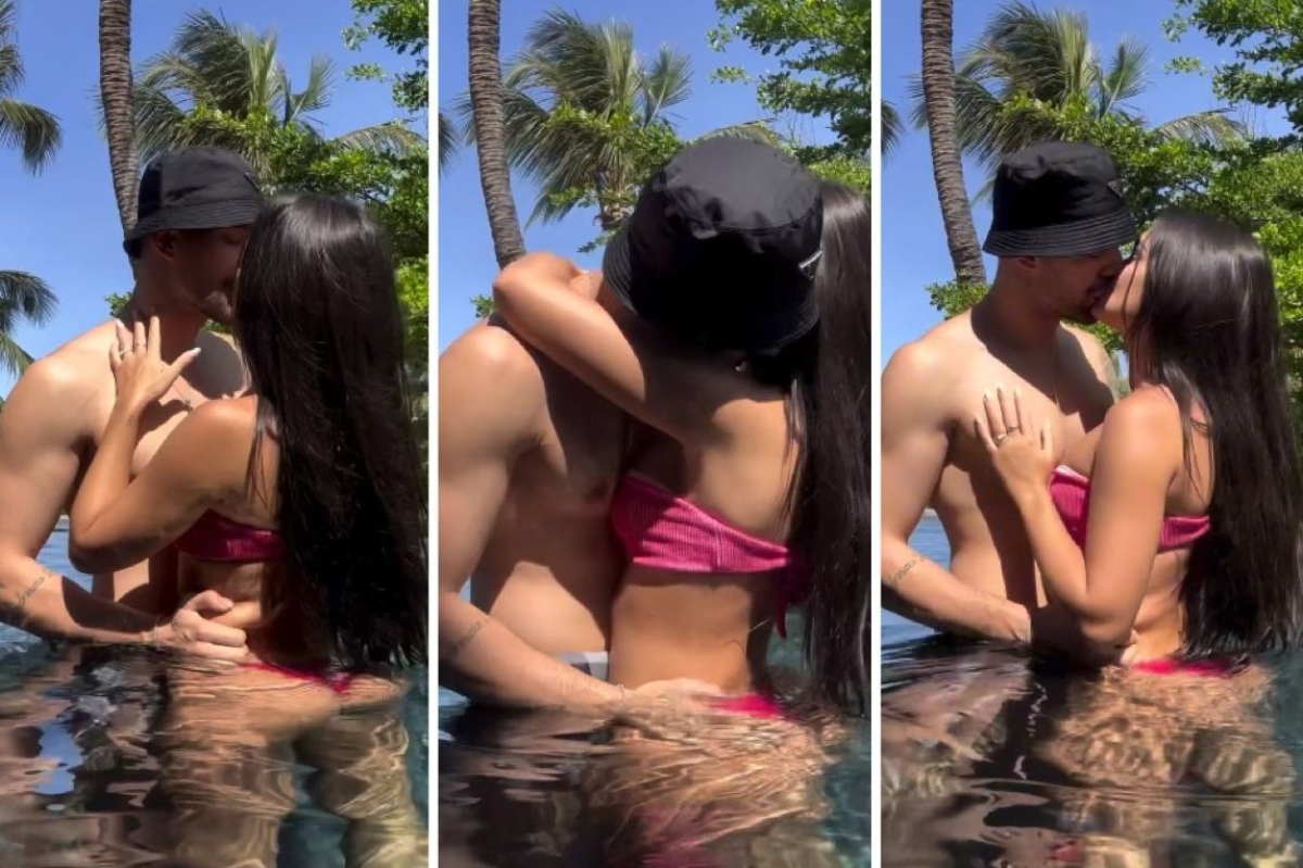 Larissa Santos e namorado na piscina, beijando